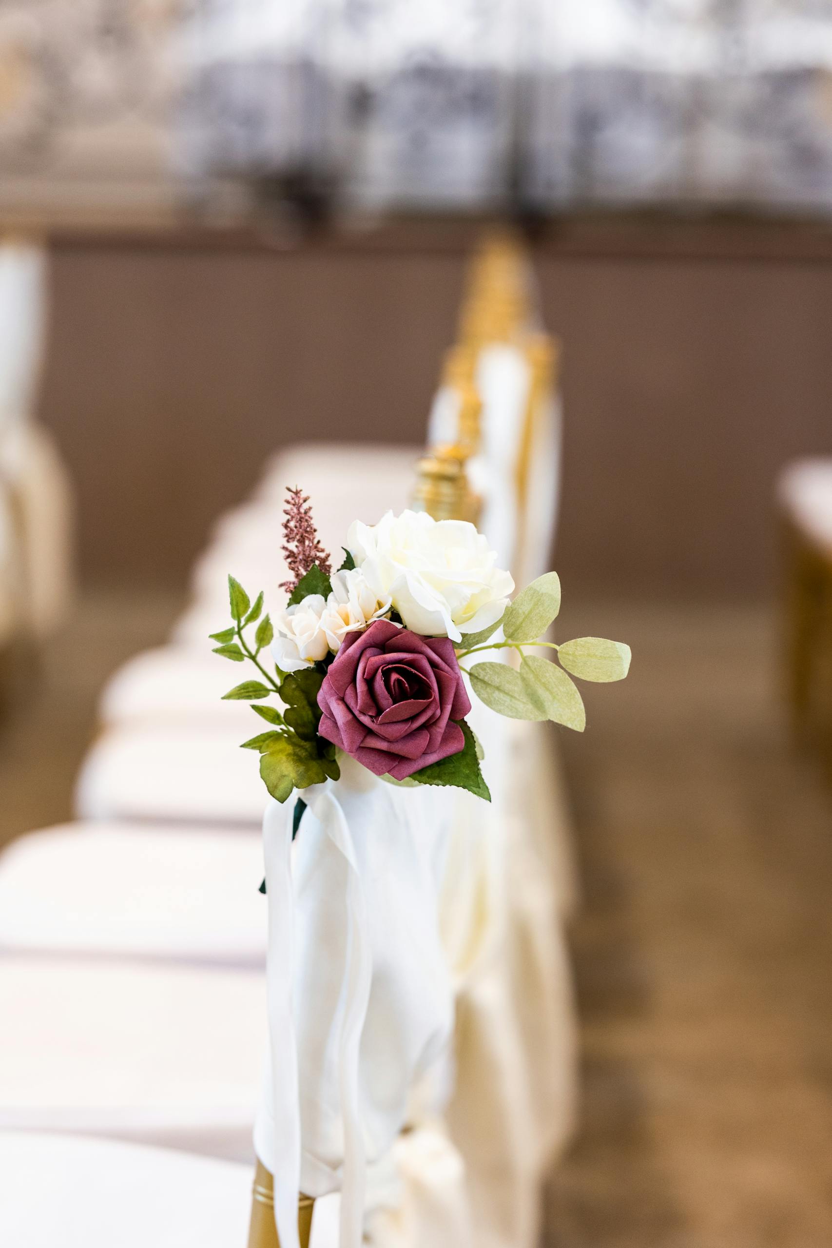 Beautiful floral arrangement on a wedding ceremony chair.